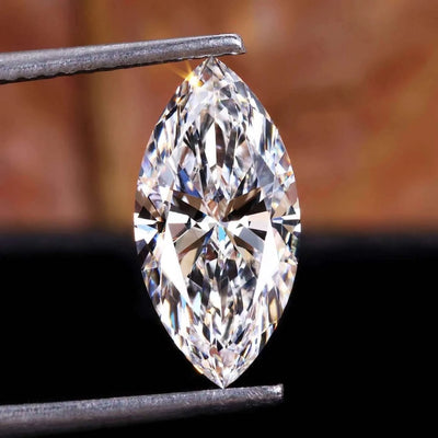 Marquise cut diamonds in Dallas, loose marquise shaped diamond in tweezers at Shapiro Diamonds in Dallas